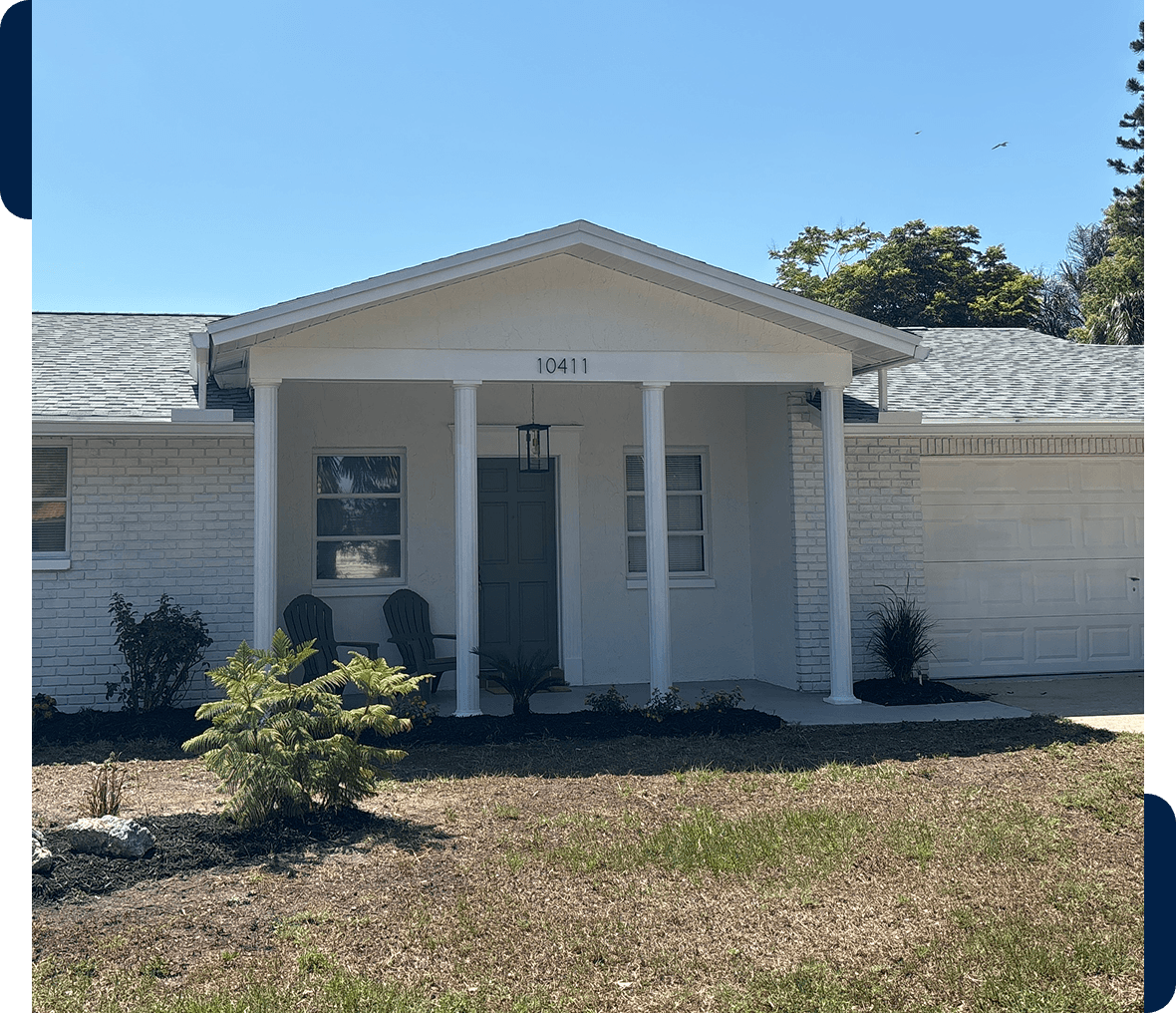 Single-story house with white columns